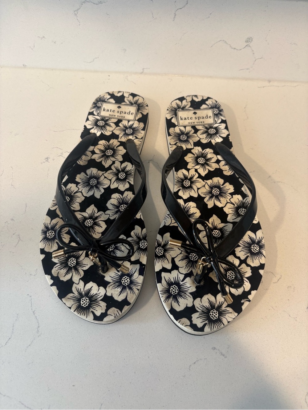 kate spade Black and Cream Floral Bow Flip Flops